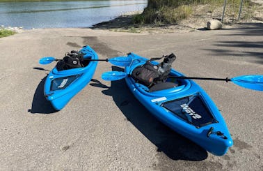 Kayak rental with paddle, life vest, and safety kit in Brooks