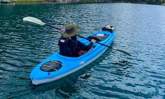 Kayak rental with paddle, life vest, and safety kit in Brooks