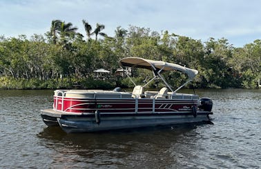 Enjoy Your Day on the Suntracker Party Barge 24DLX with a 150HP Outboard!