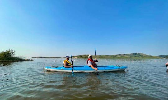Two-Person Tandem Kayak rental with paddle, life vest, and safety kit in Brooks