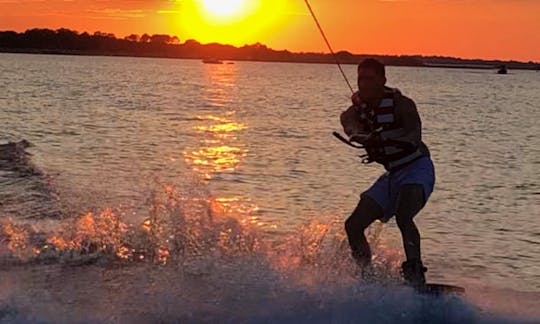 Wake Boarding, once you get up and wont want to stop.