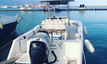 Disfruta de la pesca en Gaeta, Italia, en la consola central