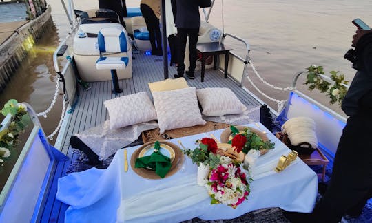 24ft customizable pontoon boat, that can fit your on the water day. *(Special service)-Picnic On A Boat $1200, with 3 course dinner, server, live musi
