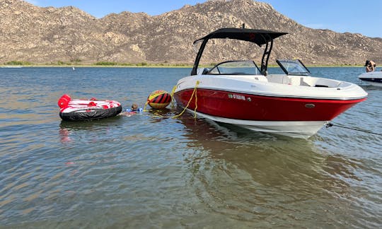 A beautiful view of the boat while beached on Lake Perris, ready for tubing fun!