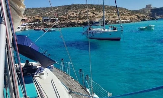 Sailing to Comino on 48ft Beneteau Sailboat