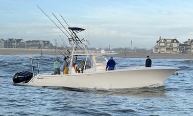 Charters de pêche sportive côtière et hauturière pour le thon, le mahi, le stripers, le bar, le fluke