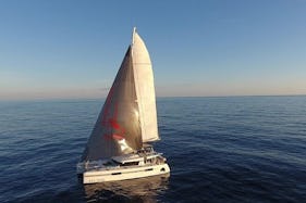Lagoon 52F Sailing with drinks and tapas in the paradisiacal Gulf of Palma