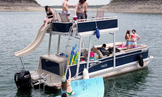 Double Decker Party Boat with a Waterslide and Lily Pad on Lake Travis