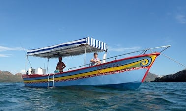 Panga boating along the coastline of San Carlos with a Marine Biologist