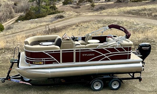 2022 Sylvan pontoon boat for rent on Holter Lake in Wolf Creek Montana!