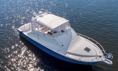 Cruise in style on a 40’ “Ocean Yachts”. Bathroom/seating for 10/private cabins