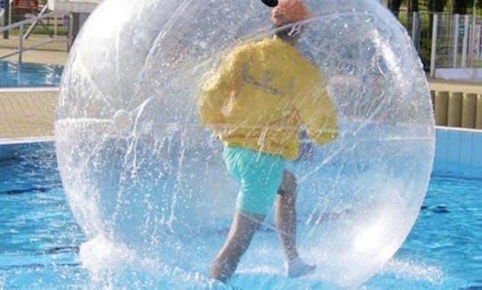 Rent a Walking Water Ball Inflatable Rafting Ball | Great for Pools, Lakes & Ponds!