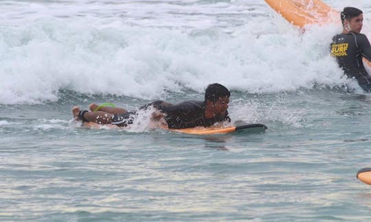 Surfing in Unawatuna, Sri Lanka