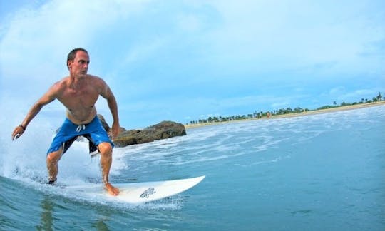 Surfing in Weligama, Sri Lanka