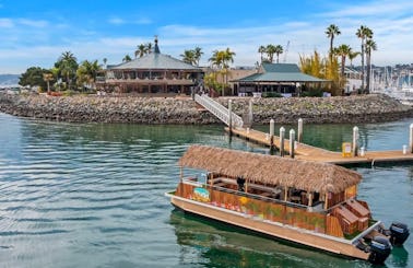 Brand new 35' catamaran Tiki boat for up to 30. Tropical themed, bar & swim platform on San Diego Bay!