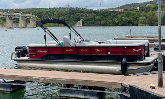 Bentley tritoon that fits 15 passengers on lake austin