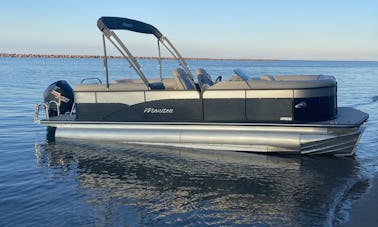 Manitou 23ft Pontoon on the Milwaukee River