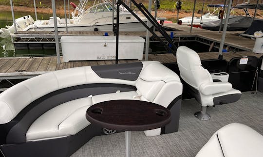 Sun loungers with adjustable and removable drink holders