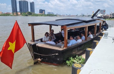 Beautiful wooden open boat for rent in Saigon