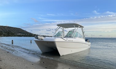 Twin hull powered boat for rent - up to 10 people