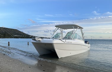 Twin hull powered boat for rent - up to 10 people