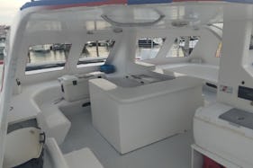Catamaran Party Boat up to 49 people. Includes: 1-Captain, 2-Mates