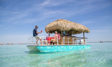Crab Island adventure on a 23' Tiki boat
