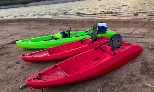 Bartlett lake Arizona 2 sit on top kayaks red with 2 person lifetime tandem lime green sitting by while we take some pics.