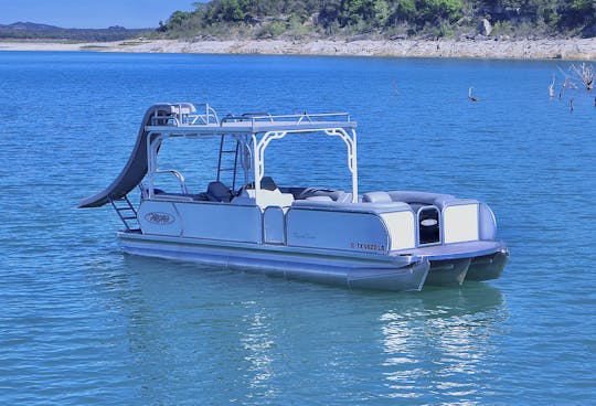 Double Decker Tritoon with Slide in Lake Travis.