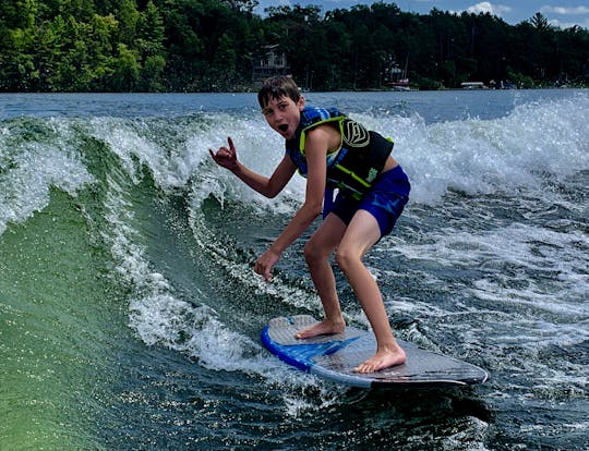 22-foot Axis A-22 Surf Boat. Lowest surf boat rates on the lake!