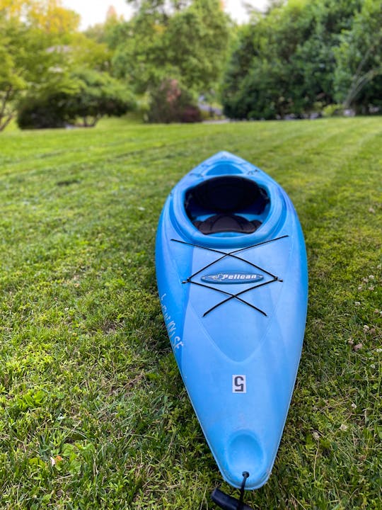 Sleek blue 9ft sit-inside kayak located near Brandywine River
