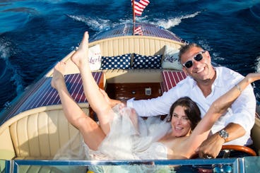 Have your elopement or wedding photos on a wooden classic boat