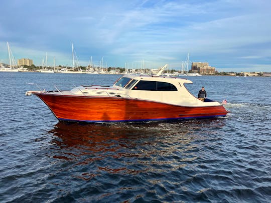 Classic Gentlemen's Yacht on Charleston Harbor sunset cruising in elegant style 