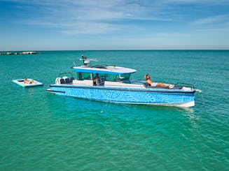 Yate a motor Axopar Suntop en Clearwater. Barco a motor de 600 CV. Puede adaptarse a grupos grandes