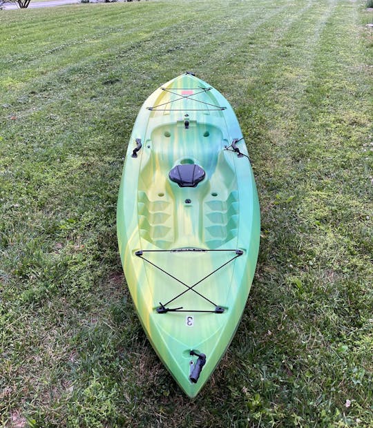 Bold yellow/green 9.5ft sit on top kayak located near Brandywine River