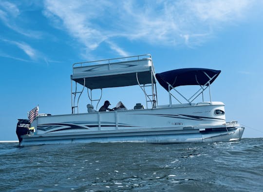 Enjoy coastal cruising at its best on our 27' Crest Pontoon!