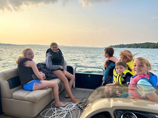 20' Godfrey 9 Person Capacity for rent on Torch Lake 
