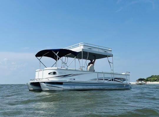 Enjoy coastal cruising at its best on our 27' Crest Pontoon!