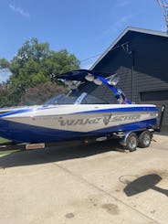 Malibu wakesetter 23’.   Gas included and captain wakeboards surf board jackets.