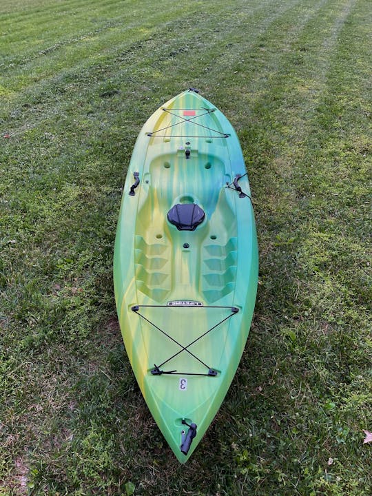 Bold yellow/green 9.5ft sit on top kayak located near Brandywine River