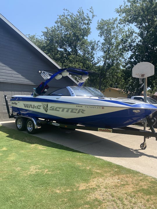 Malibu wakesetter 23’.   Gas included and captain wakeboards surf board jackets.