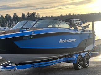 2024 Mastercraft surf boat with captain and gear