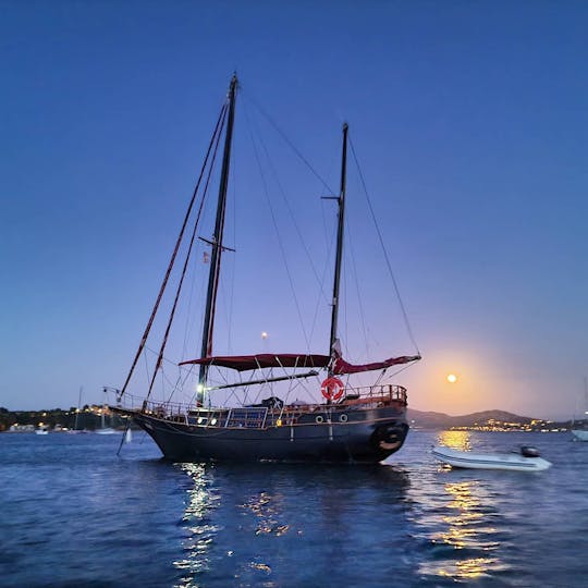 Old pirate sailboat on the coast of Pollença, Mallorca.