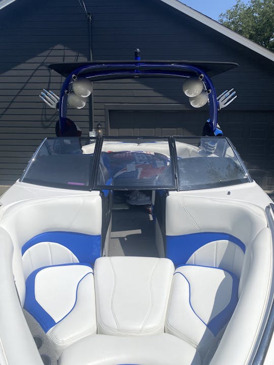 Malibu wakesetter 23’.   Gas included and captain wakeboards surf board jackets.