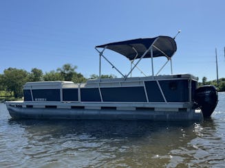 Your adventure awaits on the water with 25ft Godfrey Pontoon