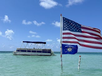 Festa charter em Sandbar a bordo do Triton Pontoon