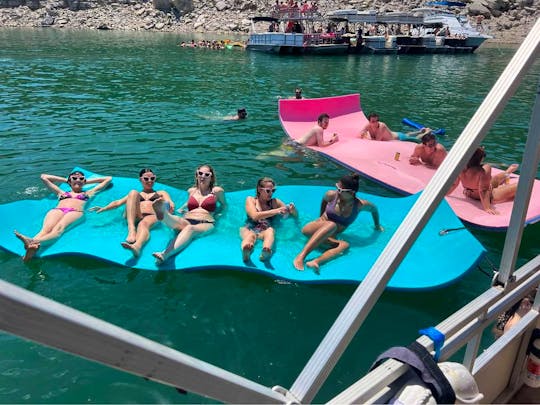 Double Decker Tiki Pontoon  with Slide in Lake Travis 