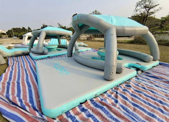 Party for up to 50 People on this Floating Oasis with 15ft Slide and Trampoline!