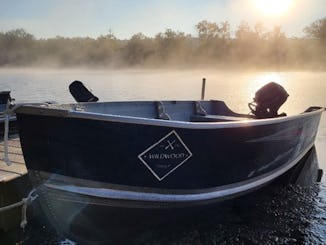 Barco de pesca de alumínio de 9,9 hp no rio Otonabee/Rice Lake