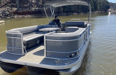 Enjoy a beautiful day on Lake Norman with a 23ft Luxury Tri-toon and free tube!